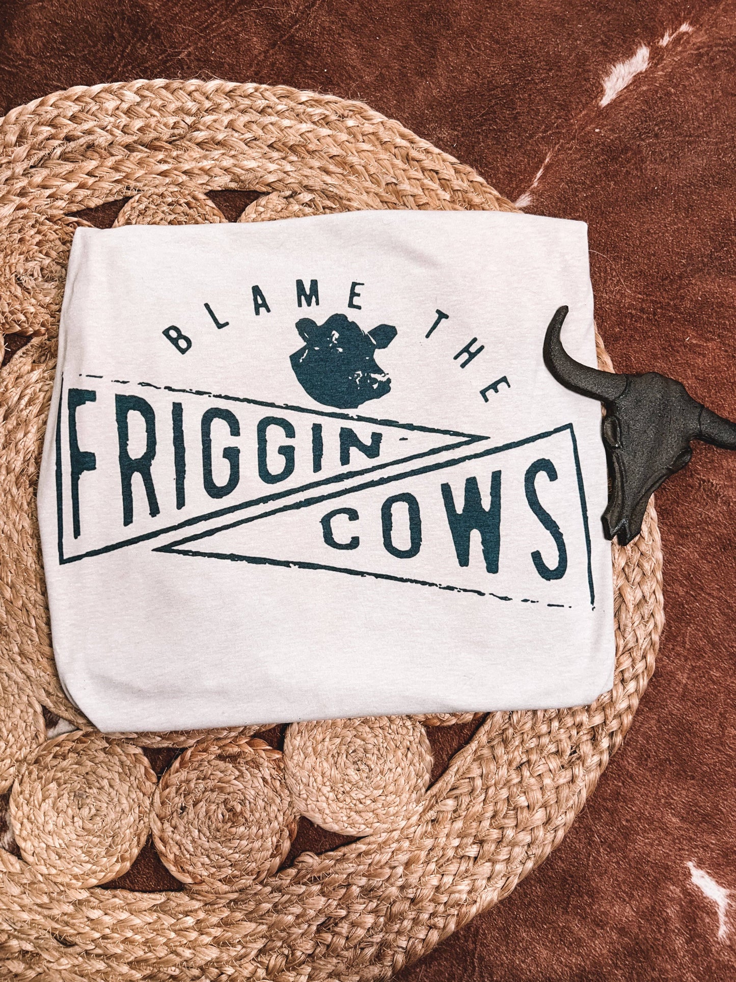 Blame the Friggin’ Cows: T-shirt (Sand) / Large